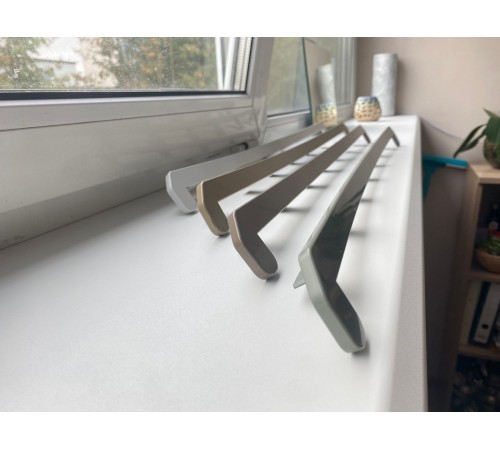 Накладка торцевая к подоконнику Alumsill 700 мм (2 кап.)