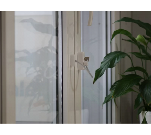 Блокиратор поворота ELEMENTIS "Топаз" с тросиком и ключом белый RAL 9016